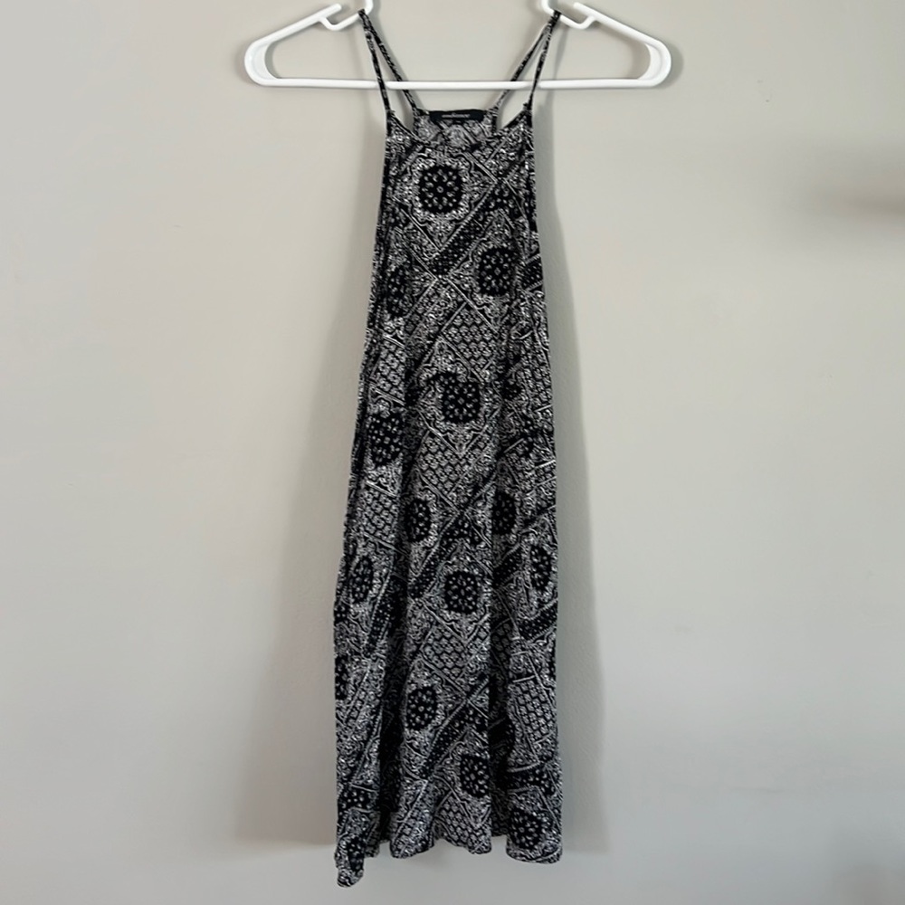 Black and white patterned spaghetti strap dress. Open on upper back